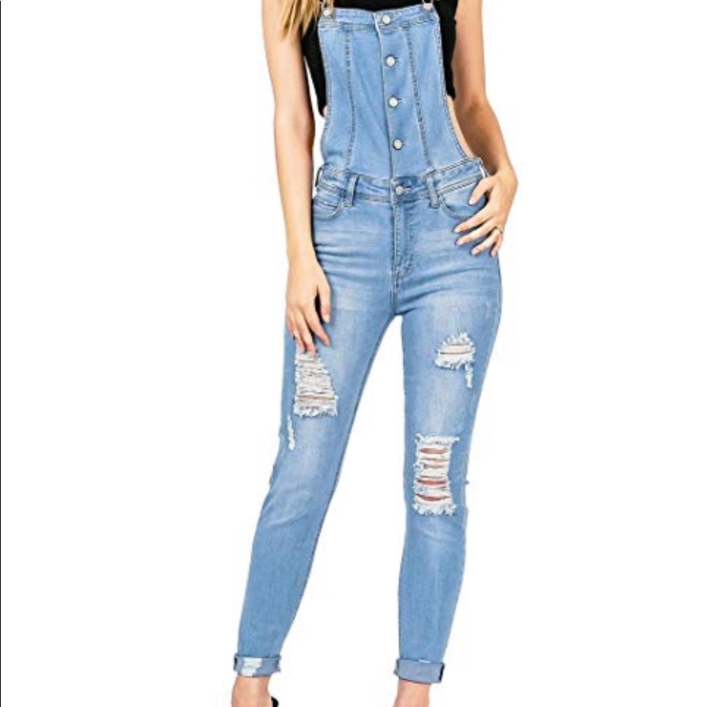 Celebrity pink distressed overalls